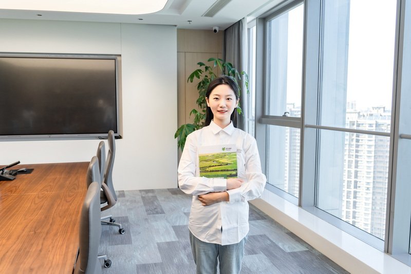 Engineers working with digital dashboards and smart manufacturing equipment