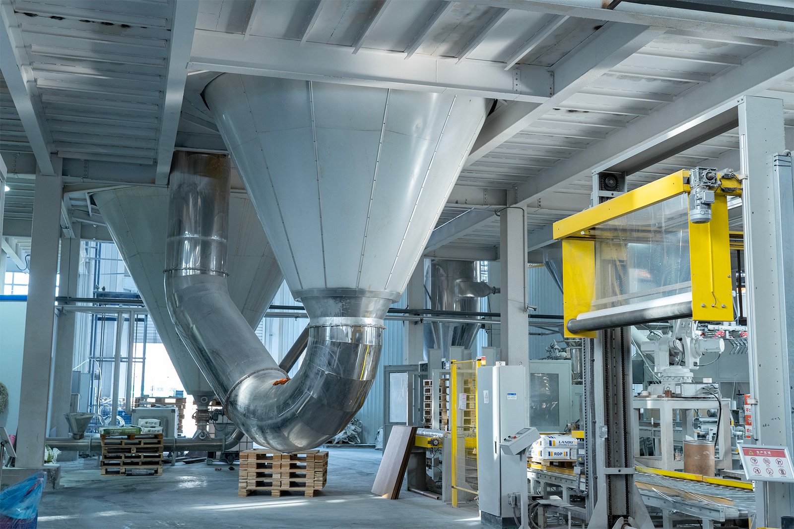 Large-scale automated factory interior with packaging lines