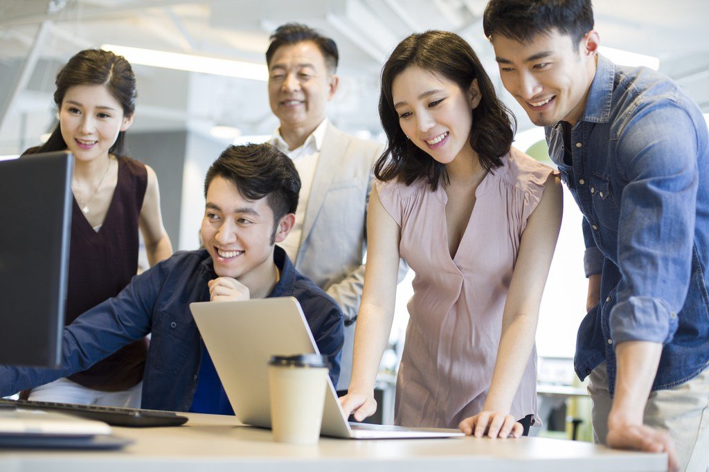 Employees reviewing documents