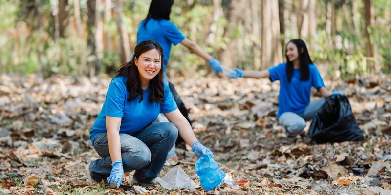 Teams participating in e-waste recycling and environmental cleanup