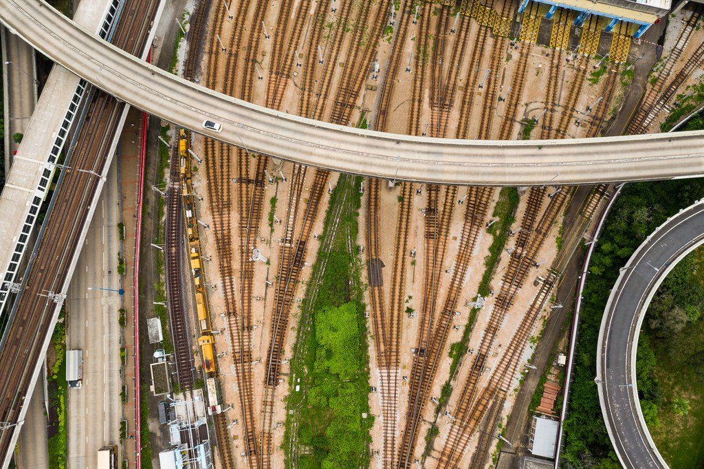 Workers constructing urban infrastructure including roads and utility systems
