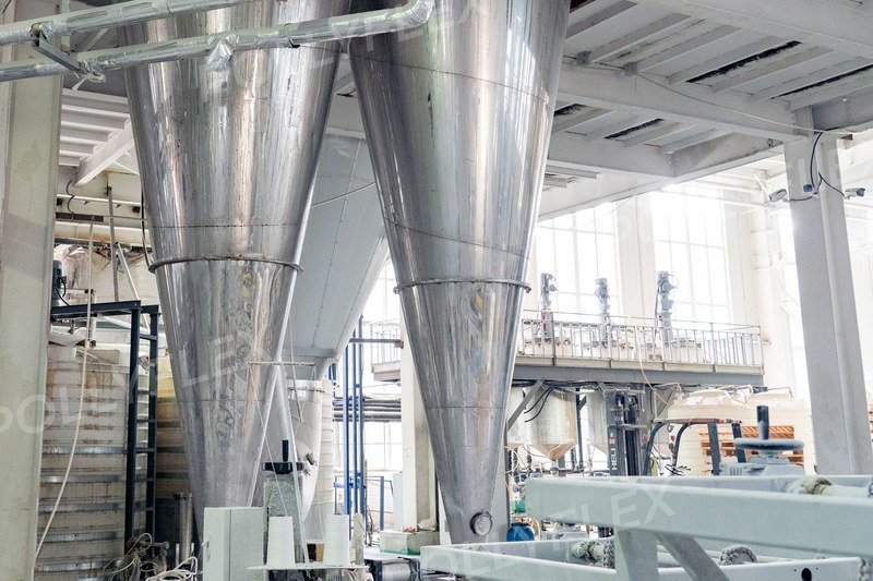 Engineers inspecting custom chemical production lines