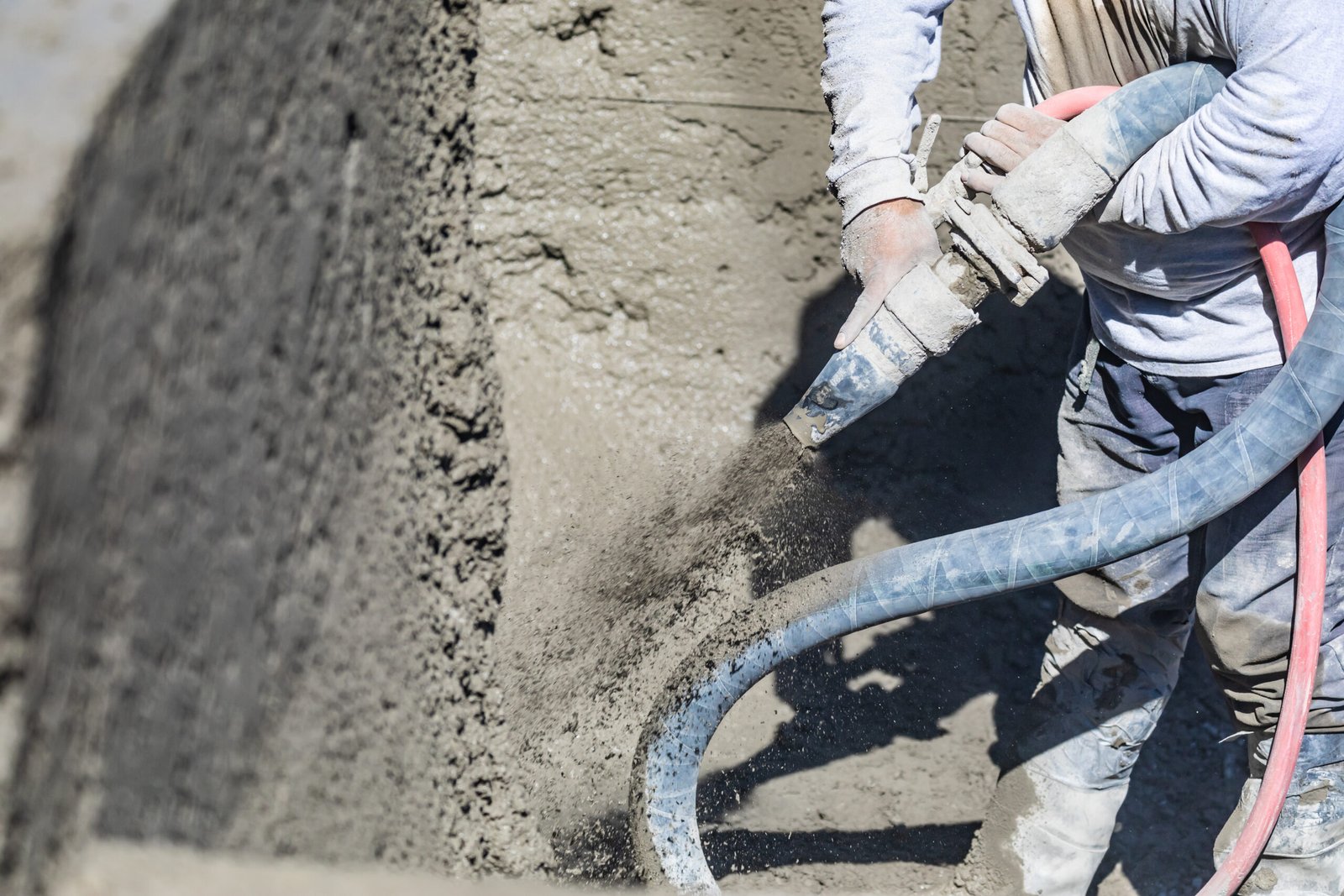 Shotcrete spray application with POLLYFLEX admixtures for tunnel and slope stabilization